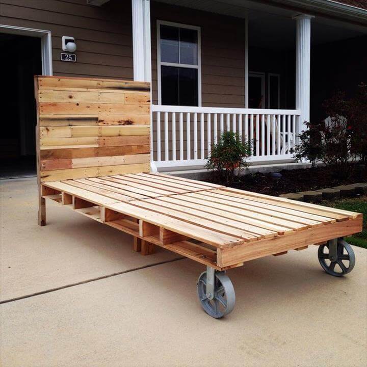  bed frame with headboard, raised on cart wheels, DIY pallet bed frame