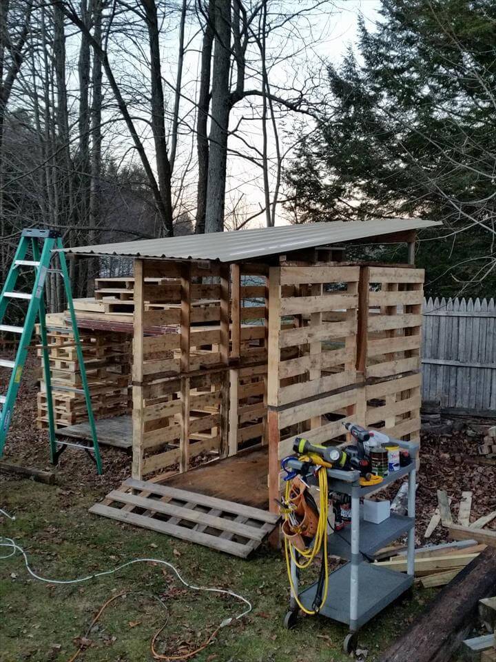 Pallet Bike Shed with Tilted Metal Roof - 101 Pallet Ideas